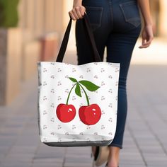 🍒 Cherry Coquette Print Tote Bag - Sweet & Stylish Accessory! 🌸 Indulge in the whimsical charm of our Cherry Coquette Print tote bag! Adorned with delightful cherry motifs and flirty accents, this bag is perfect for adding a touch of sweetness to your everyday ensemble. Features: 👜 Chic and compact design (16" x 16") for easy carrying of essentials. 🍒 Vibrant cherry coquette print adds a pop of color and personality. 💃 Durable canvas material ensures long-lasting use and style. 🌸 Perfect for trips to the farmer's market, picnics, or a day out with friends. 🎨 Available in a variety of colors to suit your personal taste. Elevate your look with the playful charm of our Cherry Coquette Print tote bag. Whether you're running errands or enjoying a day out, this adorable accessory is sure Cute Red Bags For Gifts, Cute Red Bag For Gift, Kawaii Rectangular Canvas Bag Gift, Playful Red Bag For Gift, Kawaii Tote Bag For Gift, Cute Canvas Shoulder Bag For Gifts, Cute Canvas Shoulder Bag For Gift, Cute Rectangular Shoulder Bag For Gifts, Cute Rectangular Shoulder Bag - Gift Idea