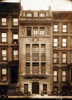 an old building with many windows and balconies