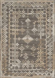 an area rug with squares and crosses on the top in grey, beige and brown colors