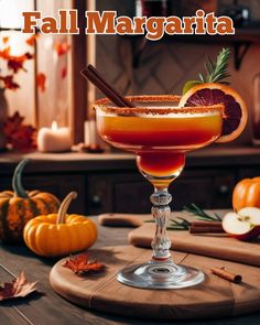 a fall margarita sitting on top of a wooden table