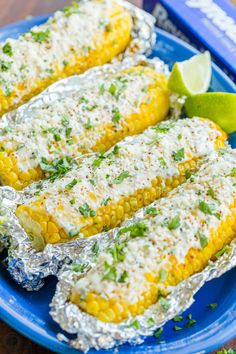 grilled corn on the cob with lime butter and parmesan cheese in foil