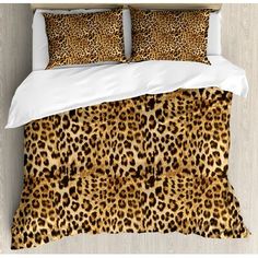 a bed with a leopard print on it