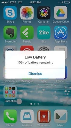 an iphone screen showing the battery status and other app icons, including buttons for different devices