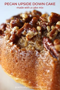 pecan upside - down cake with nuts on top and text overlay that reads pecan upside down cake simple & delicious