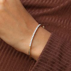 14K Solid Gold Diamond Bangle, Round Cut Moissanite Diamond Bracelet, Diamond Flex Bangle, Dainty Hinged Bracelet, Anniversary Gift For Her ✥ 𝐖𝐞𝐥𝐜𝐨𝐦𝐞 𝐭𝐨 𝐀𝐝𝐨𝐫𝐧𝐉𝐞𝐰𝐞𝐥𝐥𝐞𝐫𝐲𝐈𝐍: 𝐔𝐧𝐯𝐞𝐢𝐥 𝐭𝐡𝐞 𝐁𝐞𝐚𝐮𝐭𝐲 𝐨𝐟 𝐆𝐨𝐥𝐝 & 𝐌𝐨𝐢𝐬𝐬𝐚𝐧𝐢𝐭𝐞 𝐃𝐢𝐚𝐦𝐨𝐧𝐝 𝐉𝐞𝐰𝐞𝐥𝐫𝐲! ✥ ↣ 𝐌𝐚𝐭𝐞𝐫𝐢𝐚𝐥𝐬: 925 Sterling Silver, Gold, Rose Gold, White Gold ✥ 𝐌𝐨𝐢𝐬𝐬𝐚𝐧𝐢𝐭𝐞 𝐃𝐢𝐚𝐦𝐨𝐧𝐝 𝐒𝐩𝐞𝐜𝐢𝐟𝐢𝐜𝐚𝐭𝐢𝐨𝐧𝐬: ↣ 𝐒𝐡𝐚𝐩𝐞: Round Cut ↣ 𝐃𝐢𝐦𝐞𝐧𝐬𝐢𝐨𝐧: 2.50mm ↣ 𝐂𝐚𝐫? Daily Wear Diamond Bracelet, Jewelry Materials, Bracelet Diamond, Gold Armband, Simple Diamonds, Diamond Bangles Bracelet, Wedding Jewelry Bracelets, Hinged Bracelet, Unique Bracelets