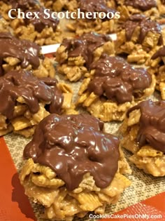 chocolate covered cookies are sitting on top of each other with the words, chex scatheroos