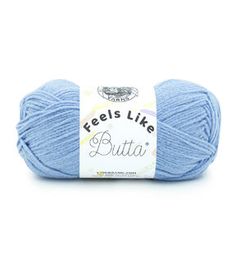 a ball of blue yarn with the words feels like buttia on it in white