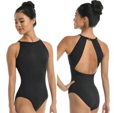 a woman wearing a black swimsuit with open back