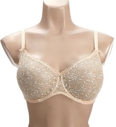 This gorgeous, sexy bra stands out with sheer tulle cups, elegant embroidery, and luxurious European craftsmanship. Made from polyamide, polyester, and elastane. Molded, underwire cups are unlined (unpadded) and fashioned from a beautiful non-stretch tulle with floral embroidery. See-through tulle cups are full coverage for breast containment with a rounded shape. Covered seam at the neckline edge maintains a secure fit. Center - tall, narrow, arched center panel has button at the top. Stretch m Sheer Underwire Bra For Wedding, Wedding Sheer Underwire Bra, Elegant Full Coverage Beige Bra, Wedding Underwire Sheer Bra, Delicate Fitted Wedding Bra, Delicate Wedding Bra, Wedding Bra With Removable Cups, Wedding Full Coverage Fitted Bra, Wedding Lace Bra In Beige