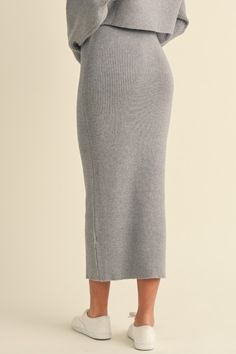 Cyrus Skirt Heather grey ribbed knit midi skirt. Elastic waistband Fitted A matching set with the Cyrus Sweater Viscose/Poly Blend | Model is wearing a Small Knit Midi Skirt, Corset Crop Top, Frankies Bikinis, Skirt Jumpsuit, Crop Top Sweater, Knit Midi, Blazer Coat, Vest Dress, Western Wear