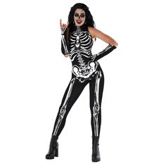 a woman in skeleton costume posing for the camera