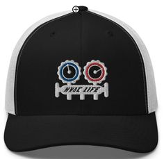 a black and white trucker hat with two gears on the front, which says wake life