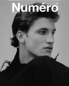 the cover of numero magazine featuring a man with dark hair and black shirt