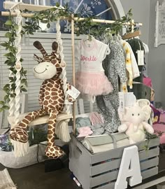 stuffed animals and toys are on display in a store window, with the number 4