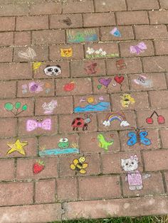 the sidewalk has been decorated with colorful drawings