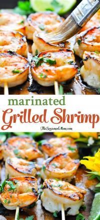 grilled shrimp on skewers with lemon wedges and parsley garnish