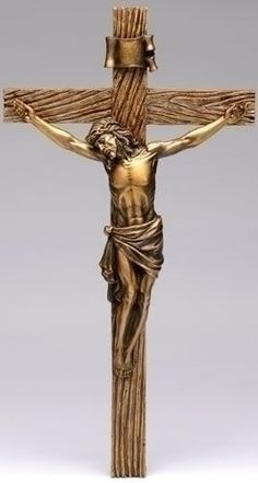 the crucifix is made from wood and has gold colored paint on it