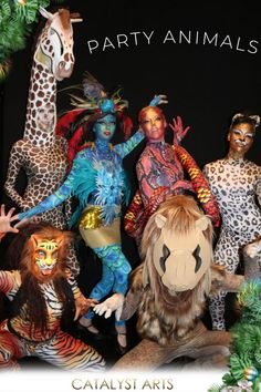 several people in animal costumes posing for a photo