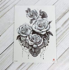 a drawing of three roses on a piece of paper