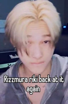 a man with blonde hair and grey hoodie looking at the camera, text reads rizmyra riki back at it again again