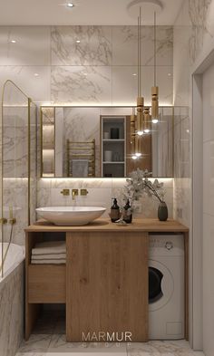 a bathroom with a washer and dryer in the corner, marble walls and floor