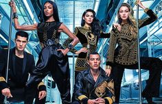 an advertisement for the brand's fall / winter 2012 campaign, featuring models in gold and black