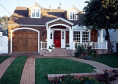 a house that has a red door and white trim