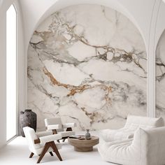 a living room with marble walls and white furniture