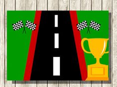 a road with a trophy and checkered flags on it, next to a wooden wall