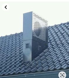 an air conditioner on the roof of a house