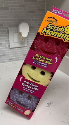 a package of scrubby morning sponges sitting on top of a sink