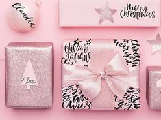 presents wrapped in pink wrapping paper with bows and ornaments around them on a pink background