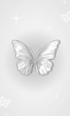 a white butterfly flying through the air