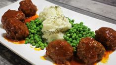 meatballs, mashed potatoes and peas on a plate