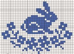 a cross stitch pattern with blue flowers in the middle and text that reads, ` person '