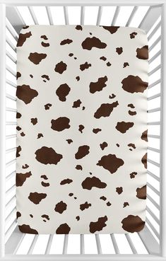 PRICES MAY VARY. Brushed Microfiber Imported Designed to fit most mini cribs, play yards, and portable cribs WILL NOT FIT STANDARD SIZE CRIBS Fully elastic bottom for secure fit - Dimensions: 24 in. x 38 in. x 5 in. pocket Brushed Microfiber - Chocolate Brown and Cream Cow Print Easy machine washable and dryable Western Baby Nurseries, Wild West Cowboys, Portable Crib, Baby Sheets, Toddler Bed Set, Mini Crib Sheets, Crib Toddler Bed, Toddler Beds, Sweet Jojo Designs