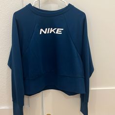 New And Never Worn. Still Has The Tags. Out Of Stock Online! Nike Blue Sweatshirt For Spring, Nike Blue Tops For Fall, Nike Blue Crew Tops, Blue Nike Crewneck, Dark Blue Nike Sweatshirt, Nike Blue Long Sleeve Tops, Nike Blue Cotton Sweatshirt, Vintage Nike Sweater, Black Nike Hoodie