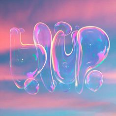 soap bubbles are floating in the air on a blue and pink background with an orange sky