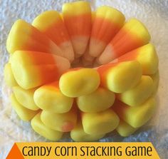 candy corn stacking game with orange and yellow candies in the shape of a flower