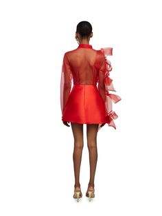 Frank Aghuno crafts elegant silhouettes from sumptuous fabrics to challenge societal notions of how Nigerian women are expected to dress. This dramatic shirt and skirt set is cut from smooth tulle and embellished with oversized crinoline bows on the transparent top. The mini skirt boasts a form-fitting silhouette with a refined minimalist construction. Wear yours to evening events where making an entrance is a must.- Point collar, button fastening on shirt, concealed back zip fastening on skirt- Shirt And Skirt Set, Nigerian Women, African Luxury, Shirt And Skirt, Transparent Top, Hair Cuffs, Red Carpet Ready, Upcycled Denim, Skirted Swimwear