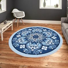 a blue and white rug in a living room