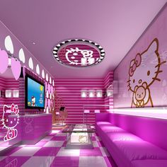 a living room decorated in pink and white with hello kitty decals on the walls