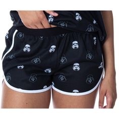 This is an Disney Star Wars sleep set! Star Wars is one of the most beloved film sagas ever! With incredible characters like Darth Vader, Yoda, Boba Fett, Luke Skywalker, Baby Yoda, The Mandalorian, C-3P0, and many more, what's not to love! This 2 pc pajama set features a short sleeve top and shorts. The top features an allover front and back design of Darth Vader and Stormtrooper heads with a classic Star Wars logo on the front. The bottoms feature the same allover design and have a stretchy wa Darth Vader And Stormtrooper, Classic Star Wars, Shorts Pajama Set, Allover Design, Star Wars Logo, Star Wars Women, Shirt And Shorts, Luke Skywalker, Sleep Set