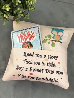 a pillow with an image of a boy reading a book on the front and back