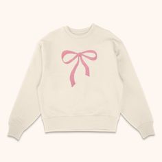 Meet the Bow Embroidered Sweatshirt – simple, sweet, and perfectly coquette. Choose your sweatshirt and bow color. Our sweatshirts are super soft, made with 100% cotton fleece, available in sizes S to 3X. Check the size chart for your perfect fit. Care is easy: wash on warm, lay flat or hang to dry. Tip: wash black and blue by themselves the first time to keep colors from bleeding. Your new staple for comfy cute is here. Coquette Christmas Sweater, Pink Clothes Aesthetic, Cricut Fashion, Bow Things, Bow Clothing, Bow Clothes, Cute Crewneck Sweatshirt, Sweatshirts Cute, Bow Sweatshirt