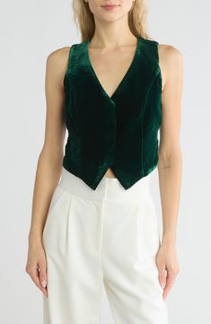 Princess seams define this elevated vest textured in sumptuous emerald velvet. V-neck Partially lined 100% polyester Machine wash, tumble dry Imported Velvet Vest Women, Chic V-neck Evening Vest, Chic Green V-neck Vest, Casual Green V-neck Vest, Luxury Chic V-neck Sweater Vest, Velvet Vest, Blazer Vest, How To Make Shoes, Princess Seam