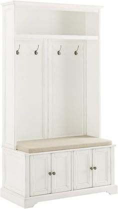 a white wooden bench with two doors on the top and one door open to reveal a coat rack