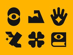 various symbols are shown in black on a yellow background, including an eye and hand