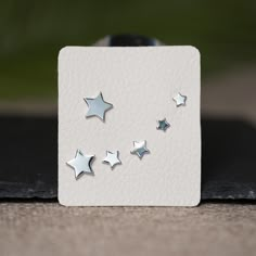 Sterling silver tiny star stud earring in variable sizes. Perfect earrings set for multiple piercings earring to layer and add extra sparkle! - Silver star stud earrings, Star stud earring gold, Star stud earring silver, Star Earrings Stud, Star earring, silver star studs, gold star earrings, starburst studs, starburst earrings - Qty: 3 pairs per set - Dimension: Variable sizes ranging from 4 mm to 9 mm in diameters - Material: 925 sterling silver, 14 K gold plated on 925 sterling silver, hypoal Nickel-free Star-shaped Silver Piercings, Nickel Free Silver Star-shaped Piercing, Silver Star Single Stud Earring, Silver Star-shaped Pierced Cartilage Earrings, Silver Star-shaped Cartilage Earrings With Pierced Design, Nickel-free Silver Star Piercings, Sterling Silver Star-shaped Piercings, Silver Star-shaped Sterling Silver Piercings, Sterling Silver Star Piercings In Silver