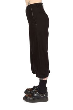 Asymmetric Skirt Pants In Black Yohji Yamamoto AW23 Body: 100% cotton. Model wears a size 1. Cecilia is 6' 0" Waist 28” Hips 36.5" Chest 34” Edgy Cotton Bottoms With Relaxed Fit, Edgy Relaxed Fit Cotton Bottoms, Edgy Cotton Bottoms For Fall, Black Cropped Leg Pants For Streetwear, Edgy High-waist Cotton Bottoms, Edgy High Waist Cotton Bottoms, Edgy Cotton Bottoms With Belt Loops, Edgy Wide Leg Bottoms With Relaxed Fit, Black Cropped Pants For Streetwear